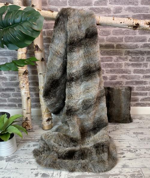 Economy, striped wolf throw and cushion