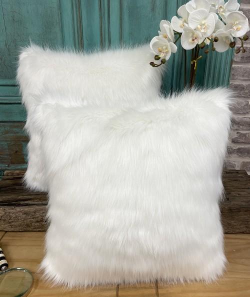 Off white faux fur cushions