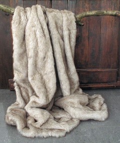 Long haired beige fur throw