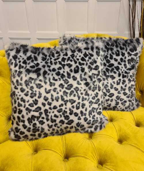Grey spotted animal print cushions