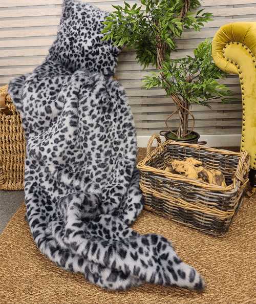 Grey and black spotted animal print faux fur throw