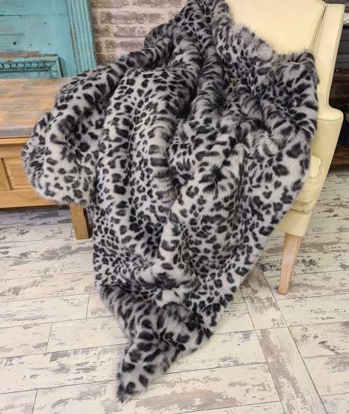 Grey and black spotted animal print faux fur bedspread