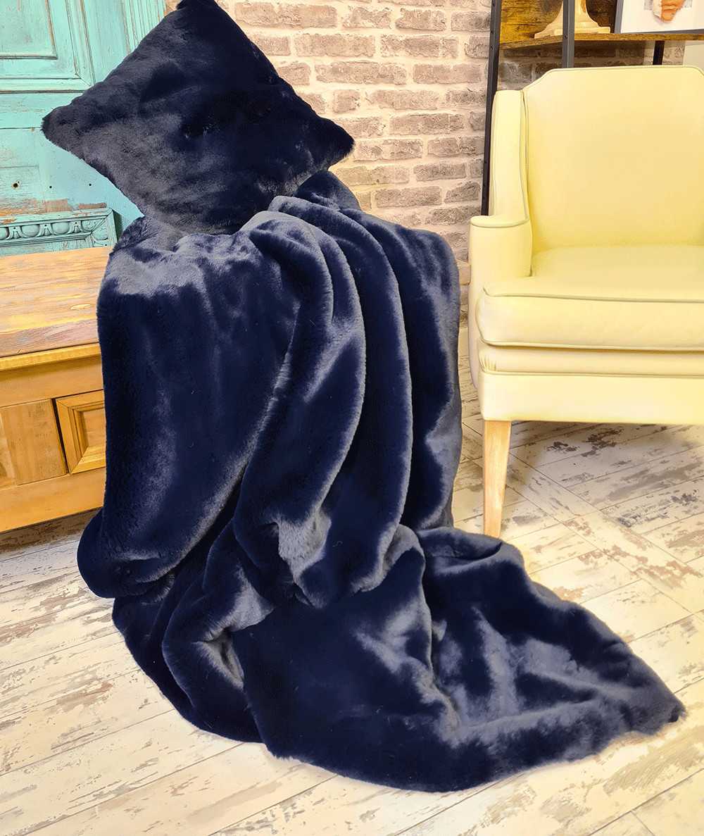 Dark blue faux fur throws