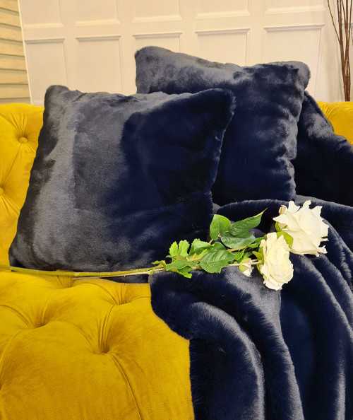Dark blue fake fur cushions
