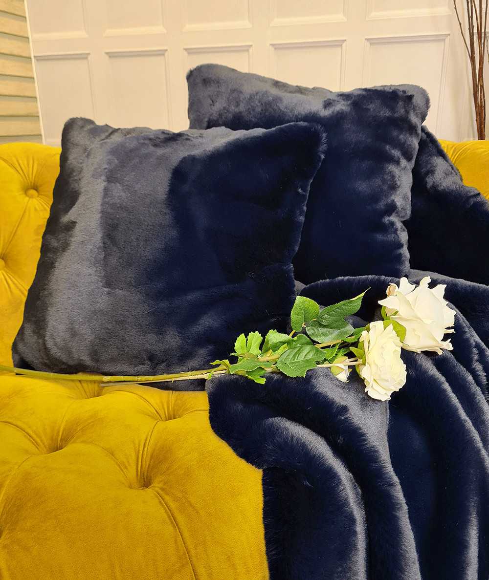 Dark blue fake fur cushions