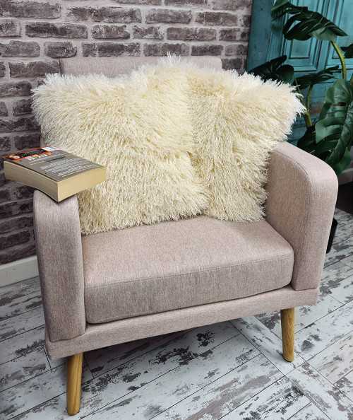 Cream long-haired curly faux fur cushions