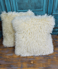 Cream long-haired curly faux fur sofa cushions