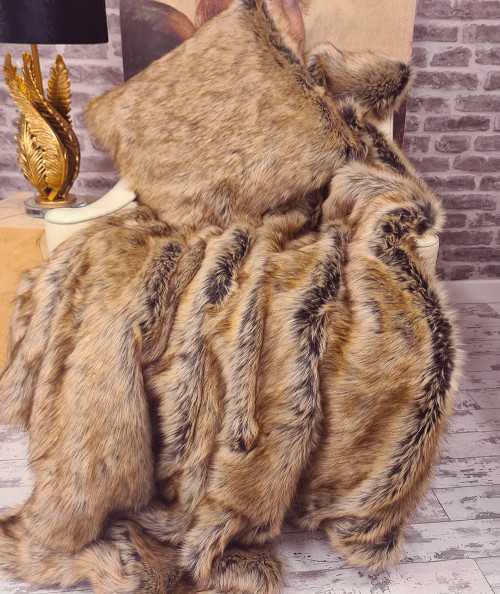 Luxury long-haired beige and brown faux fur bedspread