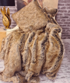 Luxury long-haired beige and brown faux fur bedspread