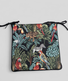 Multi-coloured square chair pads with a modern rainforest design on a rich black tapestry base