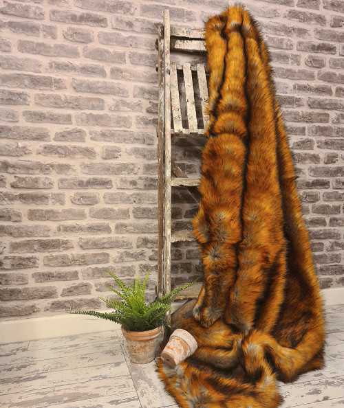 Modern ginger faux fur throw